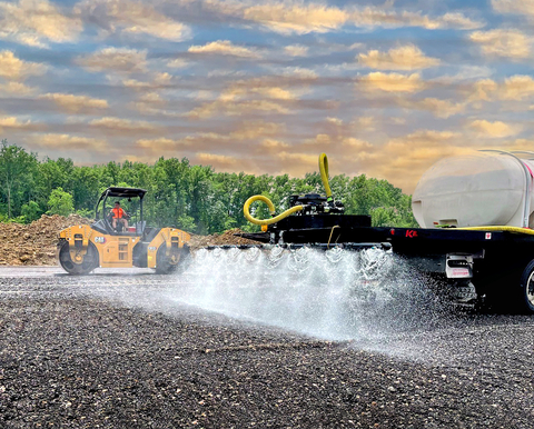 original Easy Pave is spray-applied on 100% RAP millings before being compacted with an asphalt roller. (Photo: Business Wire)