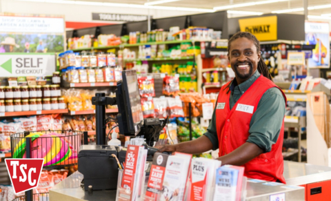 Tractor Supply Team Member at the register (Photo: Business Wire)