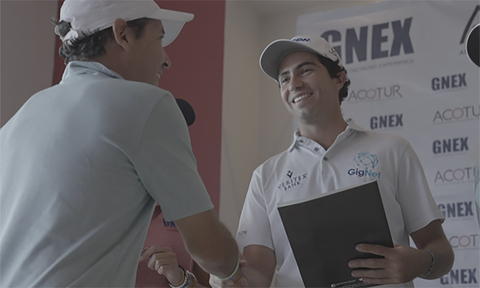 Mexico Professional Golfer and GigNet Ambassador Alvaro Ortiz greets attendees at the GNEX-ACOTUR Conference golf tournament in Cancun, Mexico, November 15, 2022. (Photo: Business Wire)