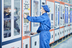 A worker monitors equipment in a fully-automated factory of FEELM. (Photo: Business Wire)