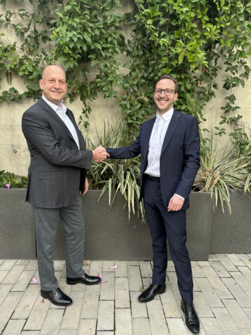 Open Systems CEO Geoff Haydon and Tiberium CEO Drew Perry join forces to bring next-gen automated cybersecurity to a global audience (Photo: Business Wire)