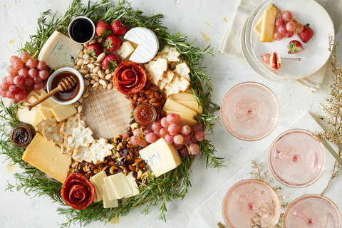 Looking for a fresh new gift exchange idea? Instead of trading ornaments or cookies, give the gift of cheese! Our cheese curators have assembled a mouthwatering collection from renowned cheesemakers. Add delicious accompaniments like crackers, jams, nuts and more—and start sharing with this gorgeous cheese wreath for easy entertaining. (Photo: Business Wire)