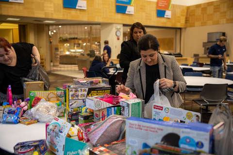 Today on Giving Tuesday, employees at Cintas Corporation’s Mason, Ohio-based headquarters packaged and delivered employee donations collected over the last month during the company’s annual holiday “Stuff the Truck” campaign. Hundreds of toys and almost 500 pounds of food items were delivered to beneficiary organizations Shared Harvest Foodbank in Fairfield, Ohio, and the Butler/Warren Counties Marine Corps Reserves Toys for Tots program in Middletown, Ohio. (Photo: Business Wire)