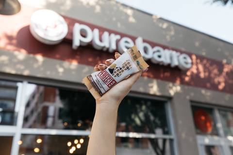 Fueling ambition across the country, Pure Barre®, the fastest, most effective full-body barre workout brand, and Perfect Bar™: The Original Refrigerated Protein Bar, today announced their partnership to support customers and clients alike in their wellness goals, throughout 2023. (Photo: Business Wire)