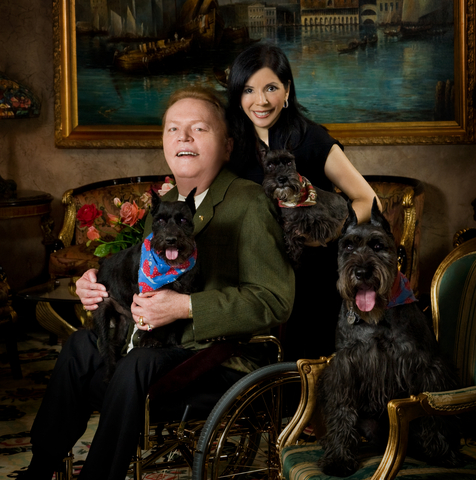 This Christmas photo of Larry Flynt and his wife Elizabeth Berrios was taken at the Los Angeles headquarters of Larry Flynt Publications in 2008. Abell Auction Co. will offer treasured items from the Flynt estate at its December 13 online sale. www.abell.com. (Photo: Business Wire)