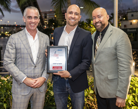 Romain Rousseau (center), vice president for COOP by Ryder accepting the Miami Inno Fire Award from Mel Mélendez, editor-in-chief for South Florida Business Journal and Cristian LaCapra, senior vice president for Northern Trust and corporate event sponsor. (Photo: Business Wire)