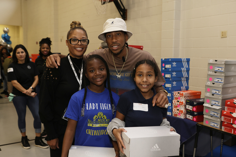 Ludacris helps hand out new shoes to students at Miles Elementary School in Atlanta, GA as part of Mercedes-Benz USA's holiday giving campaign, Season to Shine. (Photo: Business Wire)