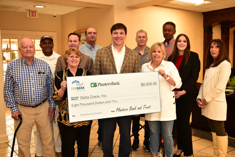 Representatives from Planters Bank & Trust Co. and the Federal Home Loan Bank of Dallas awarded $8,000 in Partnership Grant Program funds to Delta Grace Inc. (Photo: Business Wire)