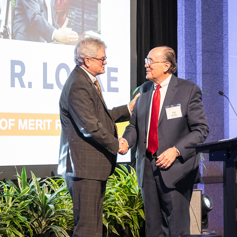 Gil Rendle, former Texas Methodist Foundation senior vice president (right) presents Tom Locke (left) with Texas Methodist Foundation’s Medallion of Merit awardin recognition of Locke’s pivotal 34 years of service at the organization. (Photo: Business Wire)