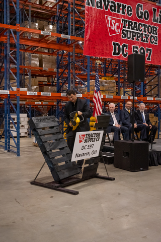 Tractor Supply CEO Hal Lawton cuts a pallet to officially open the company’s newest distribution center in Navarre, OH. (Photo: Business Wire)