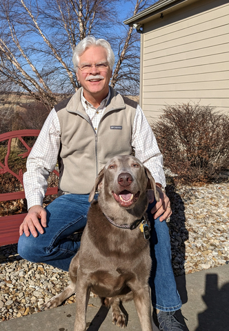 Greg Aldrich, shown with his Labrador retriever, Lucre, joins Nulo pet food as COO. (Photo: Business Wire)