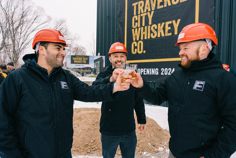 Traverse City Whiskey Company co-founders raise a glass to the official groundbreaking on the future site of its new whiskey production facility in Traverse City, Michigan. Set on 35 acres of land in the countryside, the new facility will accommodate every step in the whiskey production process (mashing, fermentation, distillation), allowing the company to significantly increase production of its award-winning portfolio of premium whiskeys and bourbon, to as many as 24,000 barrels of whiskey each year. Part of the property will also be dedicated to growing grain to be used in the company’s various distillations. The facility will also help to meet increasing demand for TCWC’s portfolio of products, which includes its best-selling Premium Cocktail Cherries and Cocktail Crate craft mixers. Pictured from left to right: Jared Rapp, Moti Goldring and Chris Fredrickson. (Photo: Business Wire)