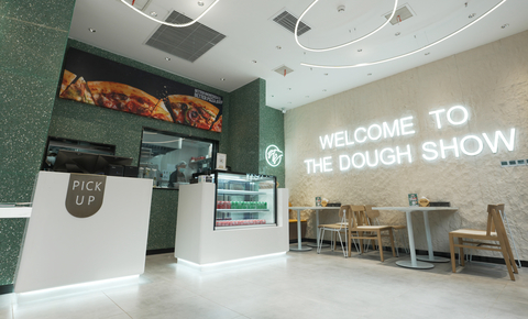 Premium ingredients – the core of the Papa Johns experience – are highlighted throughout the new restaurant through colors, lighting and decor that showcases Papa Johns new visual brand identity. (Photo: Business Wire)