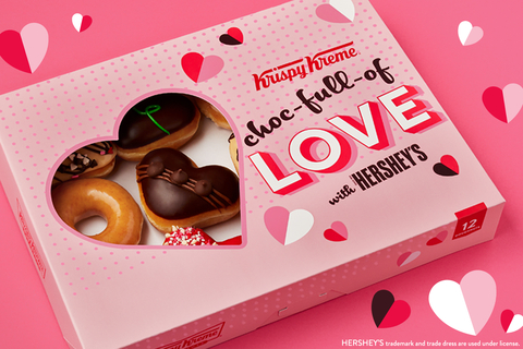 Krispy Kreme’s Valentine’s Day Dozen comes in a delightful custom red and pink “Choc-Full-of-Love” box with a heart-shaped cutout showcasing the chocolate sweet treats inside (Photo: Business Wire)