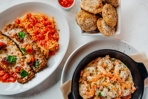 Now available nationwide alongside its complete menu of Italian fare, guests can enjoy Macaroni Grill’s highly requested takes on three classic Italian dishes –Toasted Ravioli, Shrimp Scampi and Eggplant Parmesan. (Photo: Business Wire)