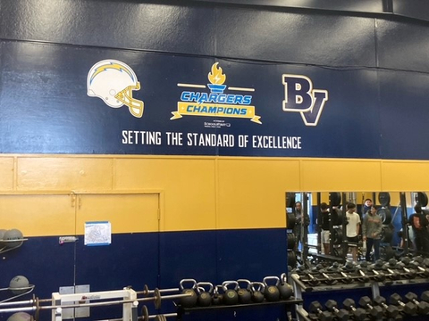 original Bonita Vista High School Weight Room which was funded by the Charger's Champion's Program through a partnership between the Los Angeles Chargers and SchoolsFirst Federal Credit Union. (Photo: Business Wire)