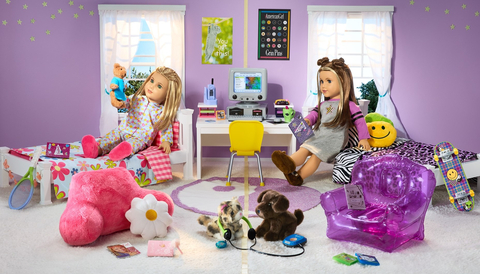 American Girl's new historical characters, Isabel and Nicki, show off their unique styles and interests in their shared bedroom decorated with '90s-era accessories. (Photo: Business Wire)