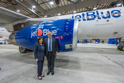 New York Governor Kathy Hochul and JetBlue CEO Robin Hayes pose in front of the "I Love NY" branded JetBlue aircraft after the JFK Terminal 6 groundbreaking event. (Photo courtesy: Office of the Governor of New York)