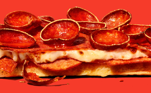 Casey's new craveable pizza is made with not one, not two, but three different types of pepperoni. (Photo: Business Wire)