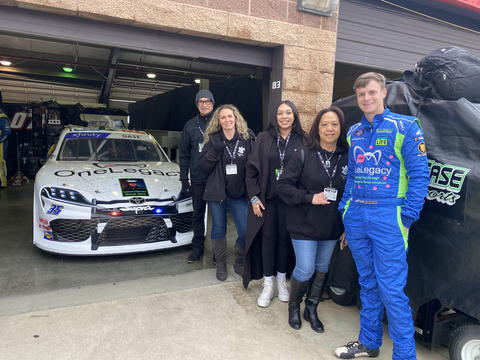 Joey Gase was joined by the family of Marine Veteran, Lance "Bo" Chavez on Sunday, before the start of the NASCAR Xfinity Race in Fontana. (Photo: Business Wire)