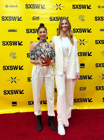 Nina Reyes and Kela Megorden of Checkerspot accept the 2023 SXSW Innovation Award in the category of Design in Austin, Texas. (Photo: Checkerspot, Inc.)