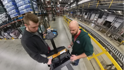 Timothy Ford and Derek Smith of Team Modern pre-release testing the Pallet Mover AMR. (Photo: Business Wire)
