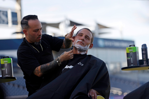 Anthony Rizzo getting an official shavedown from Gillette Barber Council Member Willis Orengo (Photo Courtesy of Gillette)