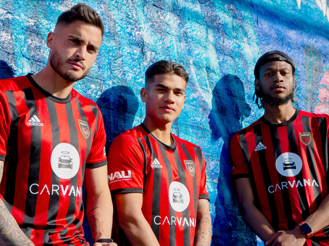 Phoenix Rising FC players showcase the team's Carvana-sponsored kits ahead of the 2023 home opener. (Photo: Business Wire)