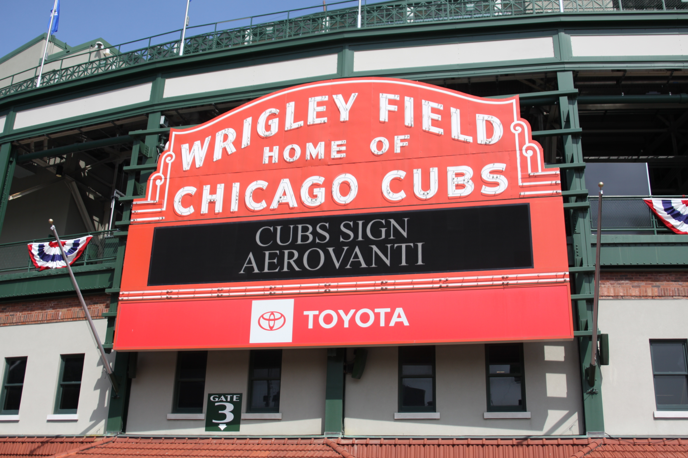 Download Chicago Cubs On City Buildings Wallpaper