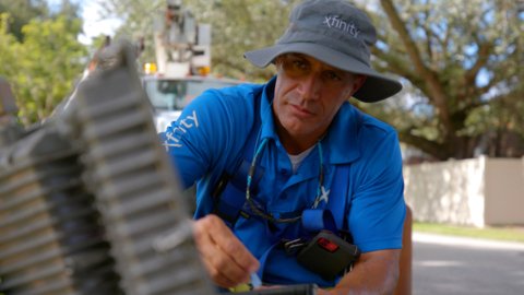 Xfinity technician installing broadband. (Photo: Business Wire)