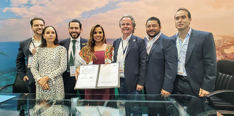 Photo: GigNet; Signing of Collaboration Agreement in Mexico City at the Annual Tianguis Tourism Expo; pictured left to right Luis de Potestad, Director of Media and Special Projects GigNet; Ana Patricia Peralta de la Peña, President of Benito Juárez (Cancun Municipality); Quintana Roo State Secretary of Tourism, Bernardo Cueto Riestra; Governor of the State of Quintana Roo María Elena Lezama Espinosa; Mark Carney, President GigNet Mexico; Orlando Emir Bellos Tun, President of Lázaro Cárdenas (Holbox Municipality); Diego Castañon Trejo, President of Tulum Municipality. (Photo: Business Wire)