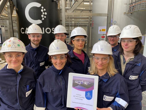Members of the Carbios team with the Technical Information Summary at the industrial demonstration unit based in Clermont-Ferrand, France (Photo: Carbios)