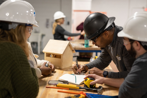 Employees learn fundamental construction and installation skills in Power's Dan Price Craftsmanship Academy program. (Photo: Business Wire)