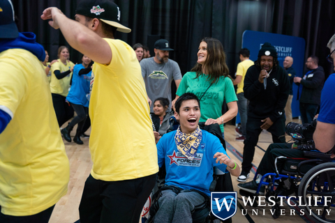 Special guest DJ Mal-Ski gets Westcliff University volunteers and the Special Forces Sports Foundation active on the dance floor for physical activity and inclusive social interaction. (Photo: Business Wire)