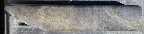 Figure 5. Core from hole KM-23-104 (at 2,829’ downhole) at the Western Target, displaying stringer to semi-massive sulfide mineralization including stringers of sphalerite and flecks of chalcopyrite. (Graphic: Business Wire)
