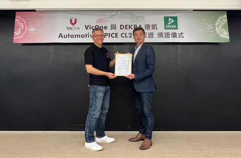 original VicOne CEO, Max Cheng (left) being awarded DEKRA ASPICE CL2 Certificate (Photo: Business Wire)