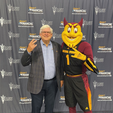 President & CEO of Desert Financial Credit Union Jeff Meshey and Sparky the Sun Devil celebrate Desert Financial Credit Union becoming the official retail banking partner of Arizona State University on April 12, 2023. (Photo: Business Wire)