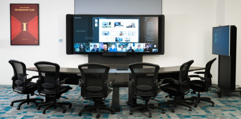 The Velocity Signature solution from AVI Systems features a 21:9 aspect ratio HD display and click-to-join touch panel controls for hybrid optimized meeting rooms. (Photo: Business Wire)