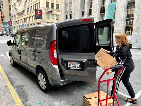 thumbnail LiquiDonate CEO & Founder, Diz Petit, loads a donation into a LiquiDonate truck. (Photo: Business Wire)