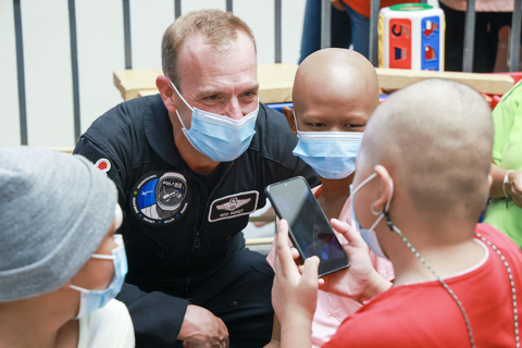Polaris Dawn Mission Pilot Scott Poteet spends time with patients of Southern Philippines Medical Center. (Photo: Business Wire)