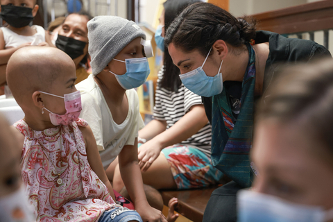 Polaris Dawn Payload Specialist Sarah Gillis spends time with patients of Southern Philippines Medical Center. (Photo: Business Wire)