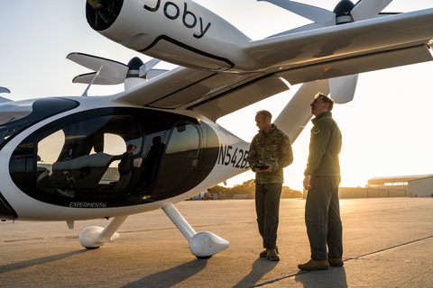 Two U.S. Air Force pilots inspect Joby’s eVTOL aircraft in advance of remotely piloted flights. Photo: Joby Aviation