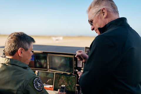 A U.S. Air Force pilot receives instruction from Joby's Flight Standards and Training Lead on the Company's remote pilot station. Photo: Joby Aviation