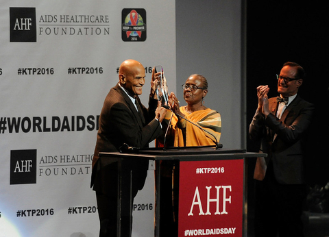 HOLLYWOOD, CA - NOVEMBER 30, 2016: Harry Belafonte receives the AHF Lifetime Achievement Award for his decades-long humanitarian and charitable works from Cynthia Davis, AHF Board Chair, and Michael Weinstein, AHF President, during AIDS Healthcare Foundation’s ‘Keep the Promise’ Concert at the Dolby Theatre in Hollywood, CA on Nov. 30, 2016. The concert, which took place on the eve of World AIDS Day, was headlined by Patti LaBelle and Common. The concert—and a march of more than a thousand down Hollywood Boulevard just before—raised awareness about HIV/AIDS in an effort to persuade key decision makers in the US and around the globe to ‘keep the promise’ and commit more funds to HIV/AIDS prevention, care and treatment. (Carlos Delgado/AP Images for AIDS Healthcare Foundation)