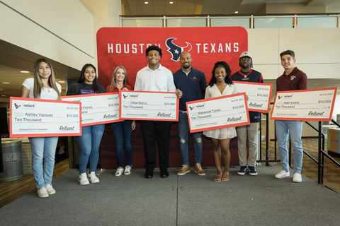 From left, Ashley Vazquez, Ilyana Flores, Leanne Schneider, director of community relations at Reliant, Dillan Botts, Cecil Shorts III, former wide receiver for Houston Texans, Makenzie Tyron, Oscar Mance, and Adan Lewis. (Photo: Business Wire)