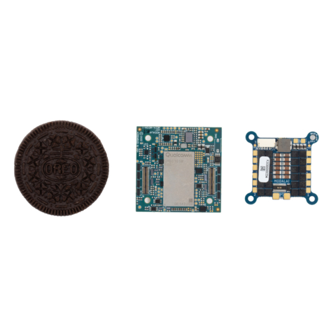 11g VOXL 2 Mini, 5.8g VOXL ESC Mini, next to an Oreo cookie. (Photo: Business Wire)