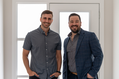 Addison Herosian (left) and Jesse Peters (right), of the Peters Herosian Group, join Real from RE/MAX Executives in Winnipeg, where their team ranked as one of the brokerage’s top performing teams in Canada. (Photo: Business Wire)