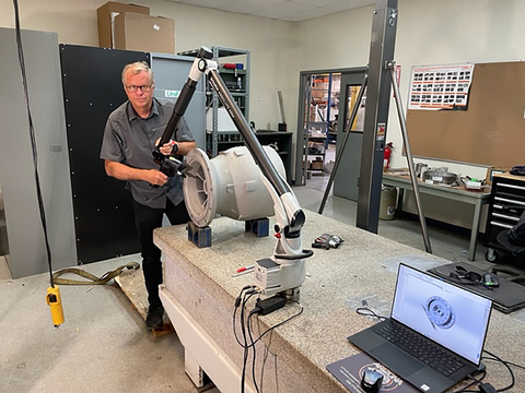 Braxton Carter Reverse Engineering and 3D measuring complex vertical pump vane with Hexagon Romer Absolute arm direct in 3D CAD. (Photo: Business Wire)