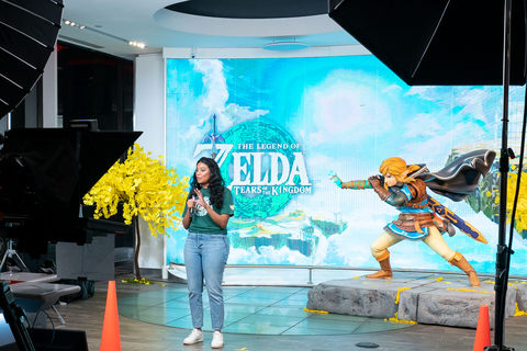 In this photo provided by Nintendo of America, Camille Salazar-Hadaway hosts the Launch Event Livestream & Nintendo Treehouse: Live from the Nintendo NY store for The Legend of Zelda: Tears of the Kingdom for Nintendo Switch. The game is available now and a direct sequel to The Legend of Zelda: Breath of the Wild, where players decide their own path through the sprawling landscapes of Hyrule and discover new destinations, dangers, sights and puzzles that require wits and resourcefulness to overcome. (Photo: Business Wire)