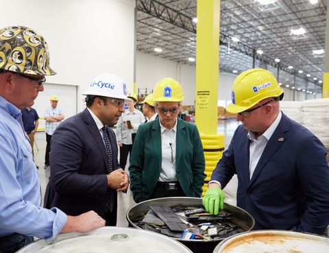 Left to right: Christopher Moon, Li-Cycle’s Arizona Spoke Plant Manager, Ajay Kochhar, Li-Cycle’s CEO and co-founder, Secretary Jennifer Granholm, U.S. Department of Energy, and Mark Kelly, U.S. Senator of Arizona, gather at Li-Cycle's lithium-ion battery recycling facility in Gilbert, Arizona, observing a collection of consumer batteries prepared for recycling. (Photo: Business Wire)